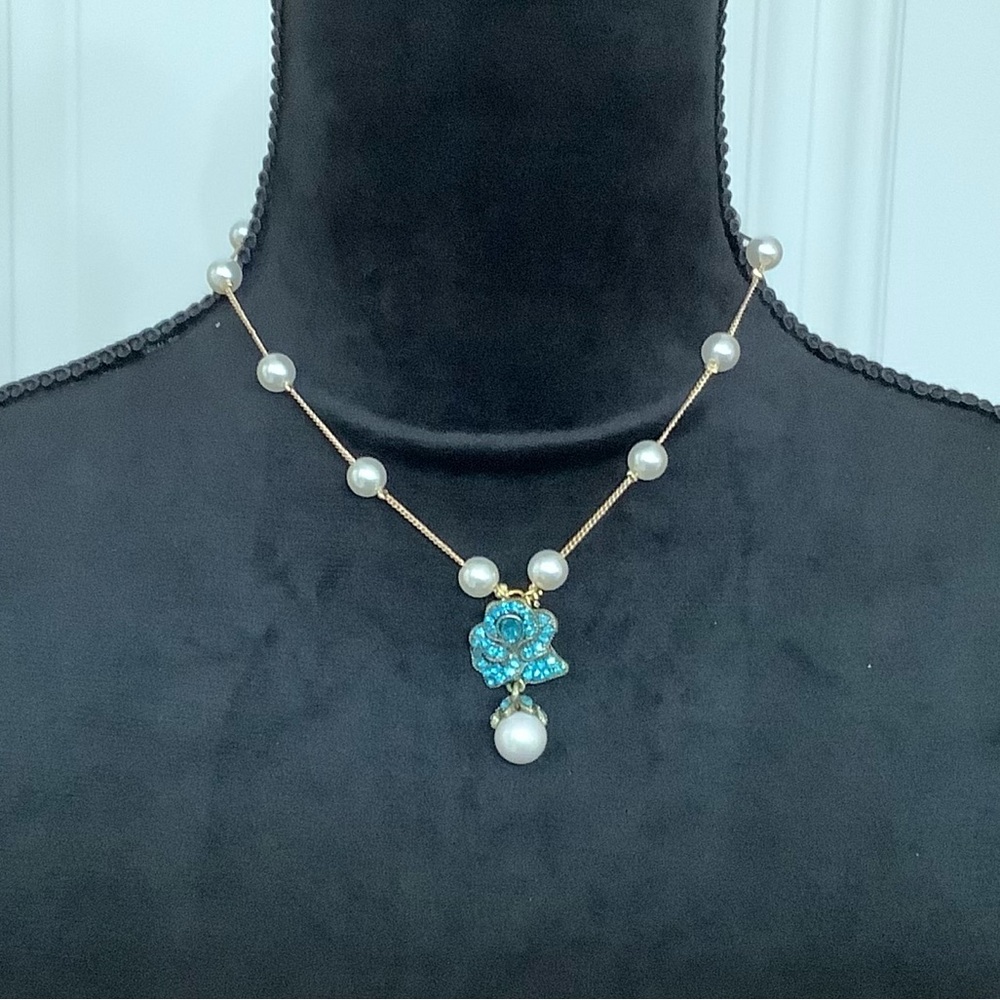 Heidi Daus Elegant Pearl and Floral Pendant With Swarovski Crystals